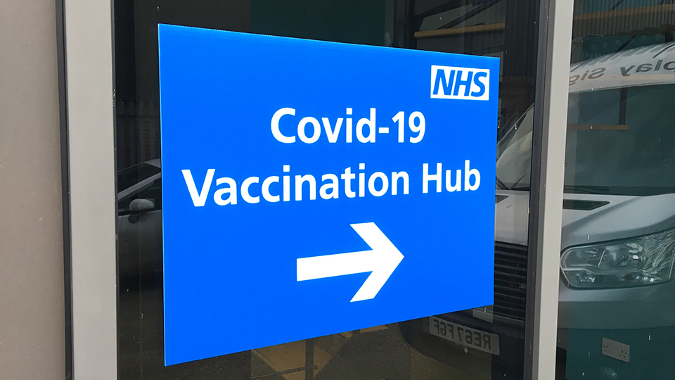 covid-19-vaccination-hub-right-arrow-sign